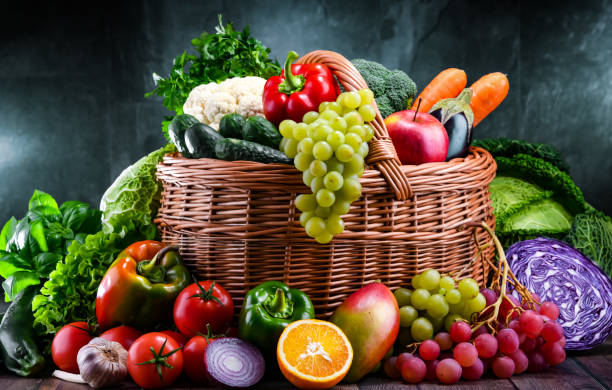 istock Composition with assorted organic vegetables and fruits 1382171900