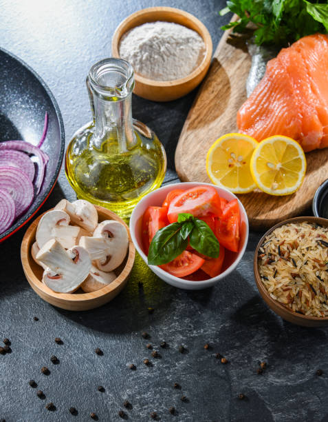 istock Fresh food ingredients prepared for cooking on a kitchen table 1382176824