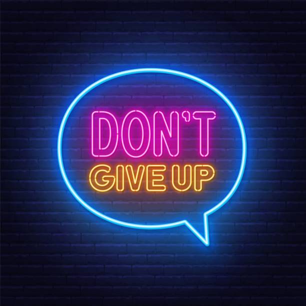istock Don't Give Up neon sign in the speech bubble on brick wall background. 1382177026