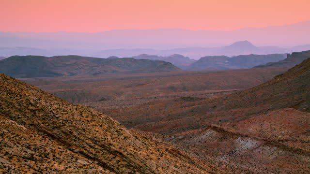 AERIAL Pink sky over Nevada, USA at sunrise