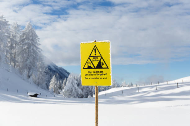 istock Sign warns about the risk of falling in ski area 1382186572