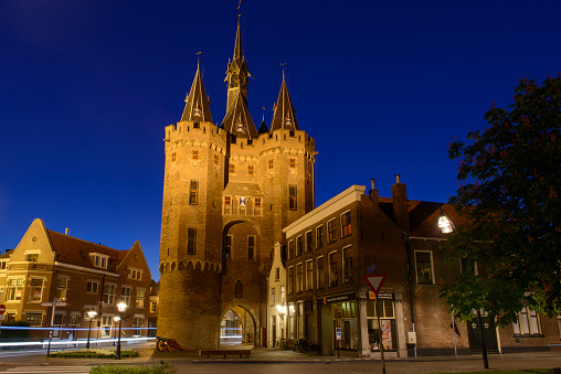 Sassenpoort gate in Zwolle at night during a summer evening in Zwolle, Overijssel, The Netherlands.