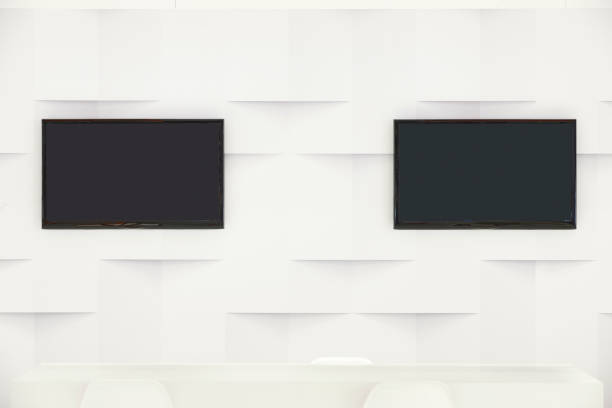 duas televisões em uma parede branca. design de apartamento moderno e elegante - ife - fotografias e filmes do acervo