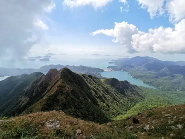 Photo of Aerial view of Kau Nga Ling (Dog Teeth Range) shooted from Lantau Peak of Hong Kong, with Shek Pik Reservoir and Soko Islands as the backdrop