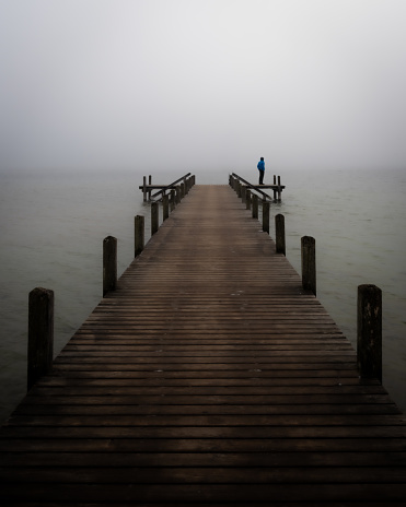 lonesome jetty in the fog
