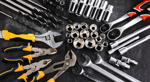 composition with a variety of metal tools - bolt nut screw hardware store imagens e fotografias de stock