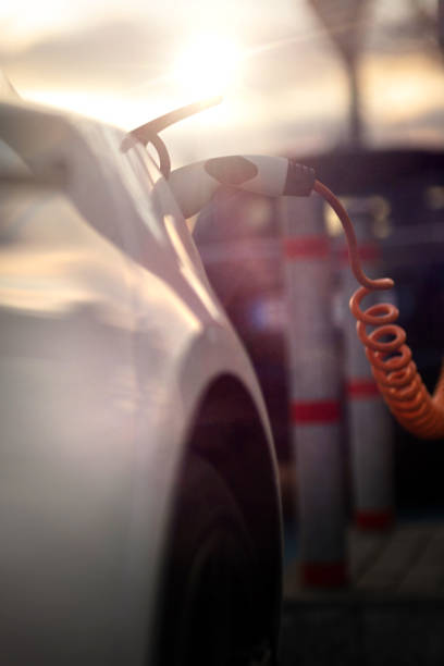 istock Electric Car Charging At Power Station 1382194902