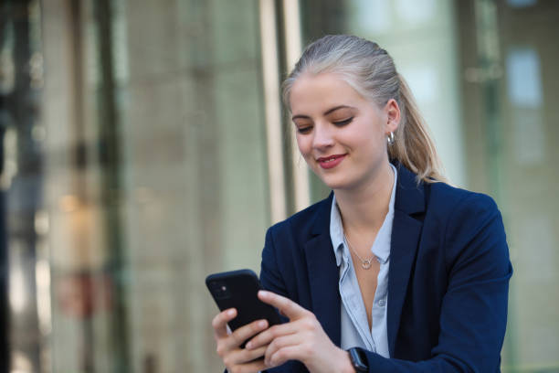 istock Woman with her phone 1382205439
