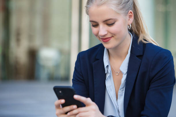 istock Woman with her phone 1382205447