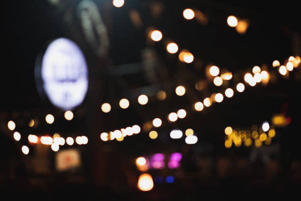 istock Blurry bokeh lights in a restaurant Liquor store at night. 1382205570