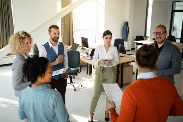 istock Multiracial group of business team having a casual conversation 1382208914