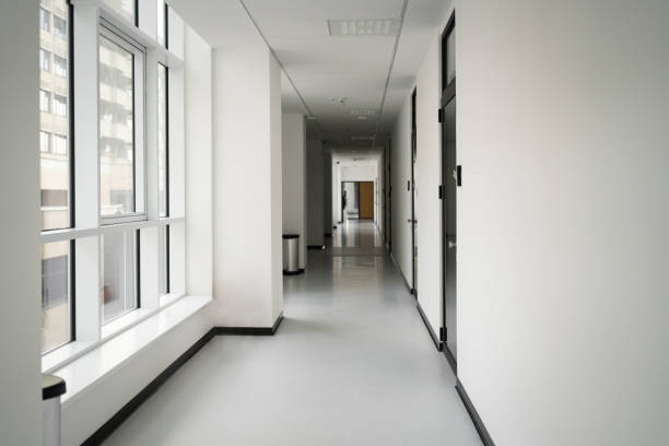 istock Long empty hall at the corporate building 1382218149