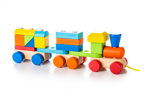Front view of a wooden colorful train toy isolated on white background.