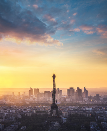 Paris skyline with Eiffel tower at sunset. View from above.