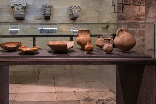 Nazareth, Israel, February 12, 2022 : Well-preserved remains of pottery on display in the museum of the Church Of Annunciation in Nazareth, northern Israel