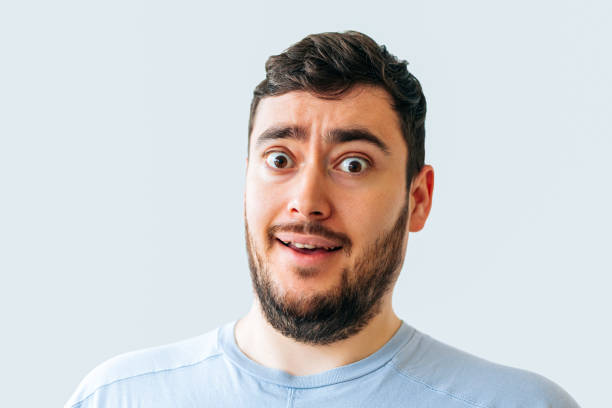 istock bizarre and strange bearded man. 1382264216