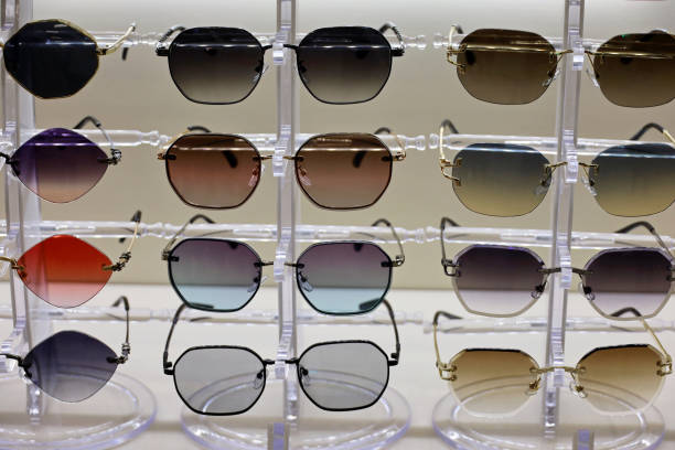 istock Sunglasses with multicolored glasses in a shop window 1382265301
