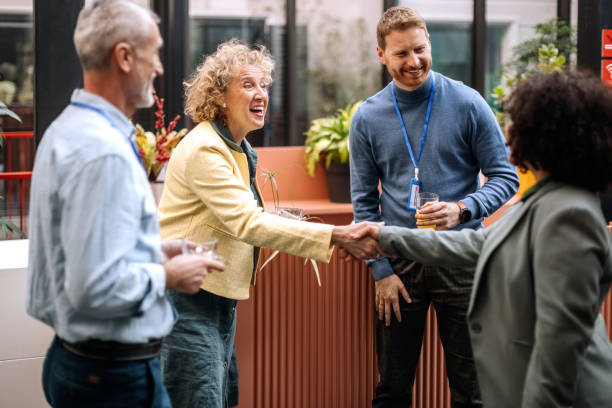 Business people on a break while attending business conference