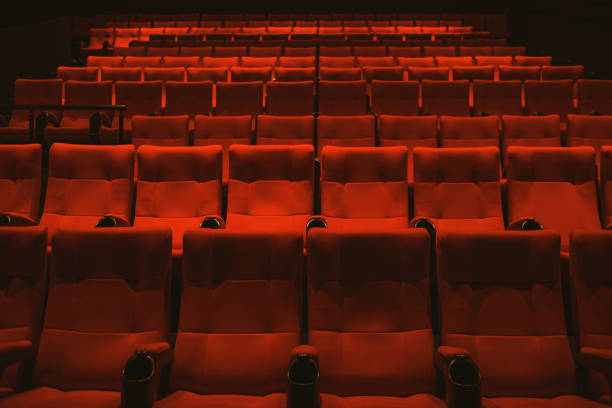 istock Red colored cinema seats with no people 1382271444