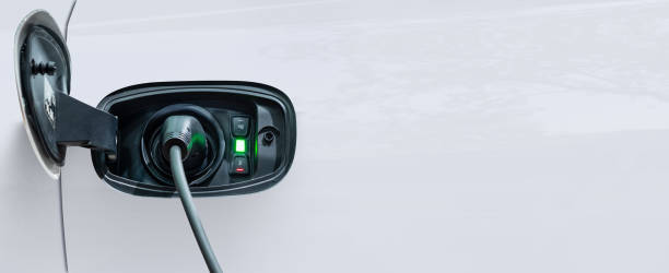 istock White electric car charging with copy space, Technology electric vehicle concept 1382273576