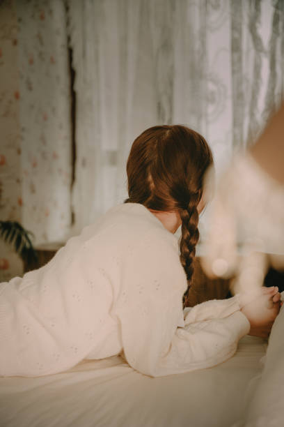 istock Asian girls resting by the bed 1382274661