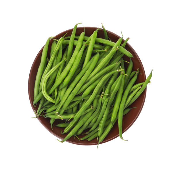 istock Fresh green beans in bowl isolated on white, top view 1382276555