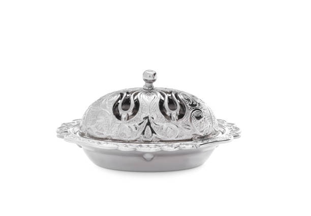 istock Vintage metal butter dish with lid isolated on white 1382287547