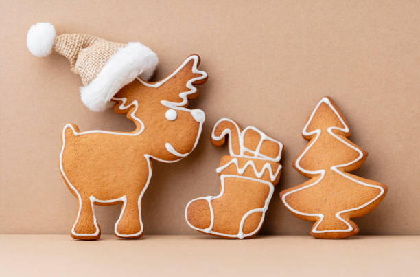 istock Gingerbread man, cookies and Christmas decor on pastel background. 1382294812