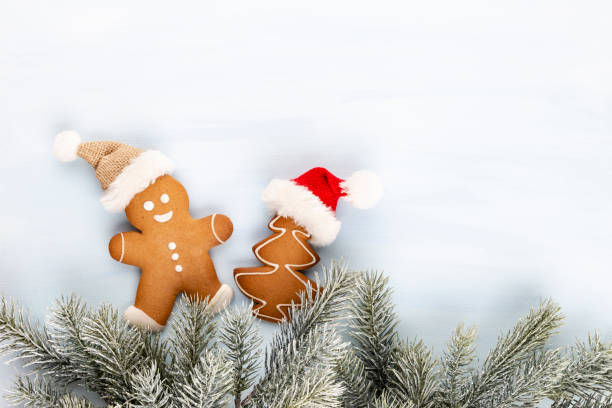 istock Gingerbread man, cookies and Christmas decor on pastel background. 1382294827