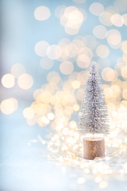 istock Christmas spruce with tree and blurred shiny lights. 1382294854