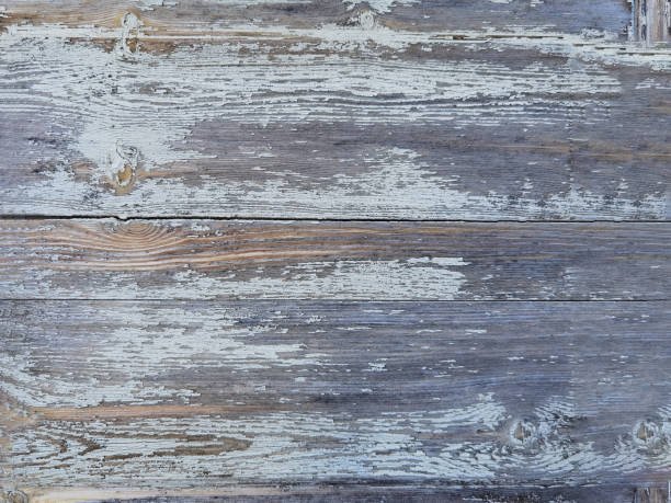 istock old planks washed out  white color table wooden background 1382295682