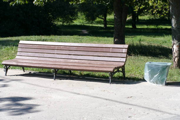 istock bench  in park at dry sunny summer day 1382302720