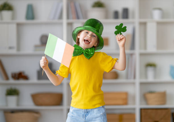 istock child is celebrating St. Patrick's Day 1382306072
