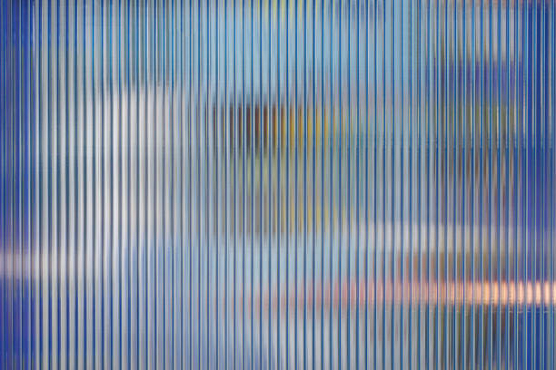 blue polycarbonate plastic background and texture. transparent material corrugated plastic surface use for partition wall or roofing. - acrylic imagens e fotografias de stock