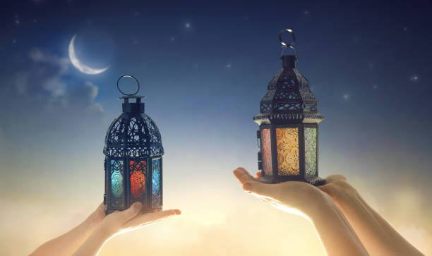 istock Ornamental Arabic lantern with burning candle 1382318166