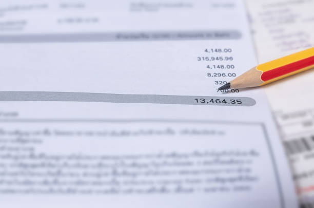 istock Utility energy bill with pencil blurred background 1382334558