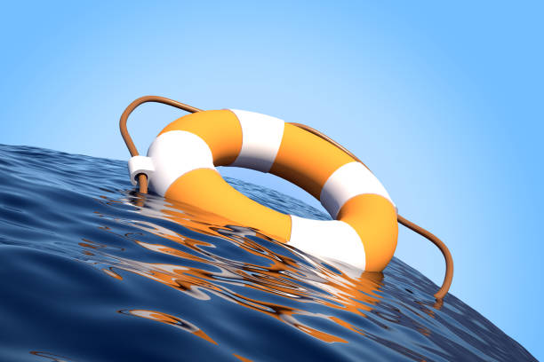 istock Lifebuoy on curved ocean surface with horizon 1382348485