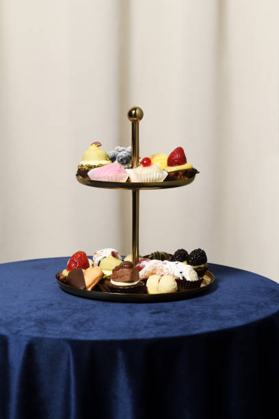 istock Vintage vase with mini cakes 1382353525