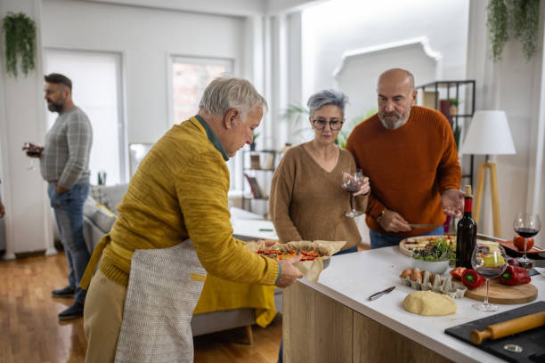 istock Party hist making vegan pizza for his guests 1382354438