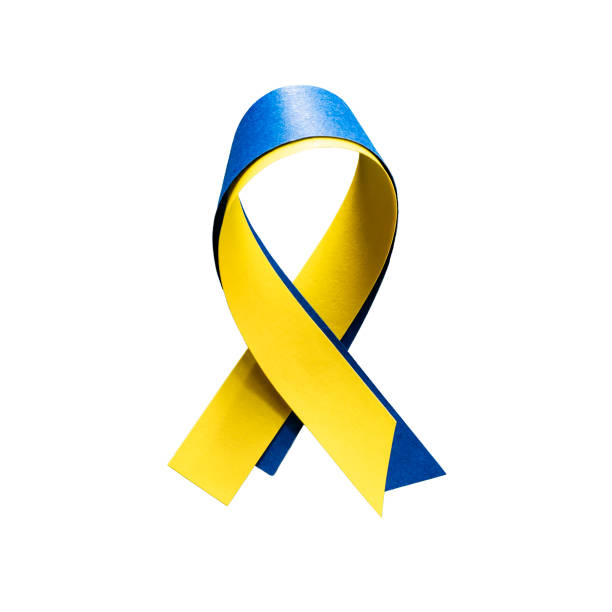 istock Blue and yellow ribbon for Ukraine on white background 1382359203