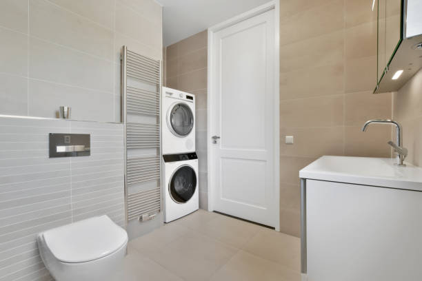 istock Bathroom with toilet and washing machine 1382368506