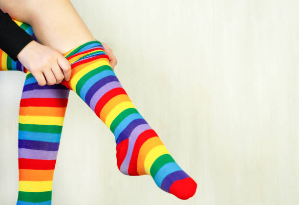 istock Colorful striped socks. Knee-length multicolored knit socks. 1382371430