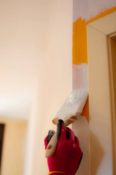 istock Painters refurbishing a small apartment. 1382371534