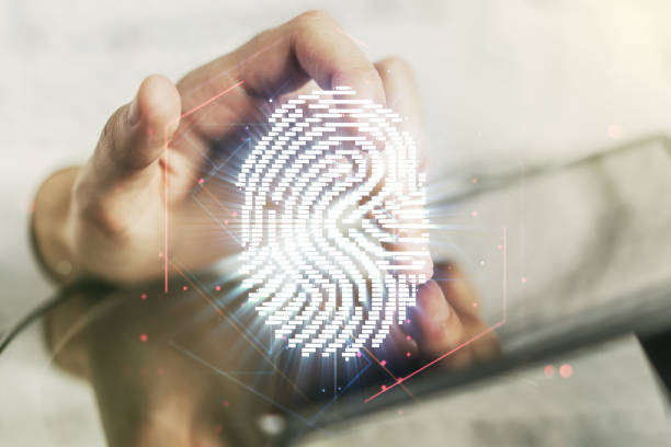 istock Double exposure of abstract creative fingerprint hologram with finger clicks on a digital tablet on background, protection of personal information concept 1382372659