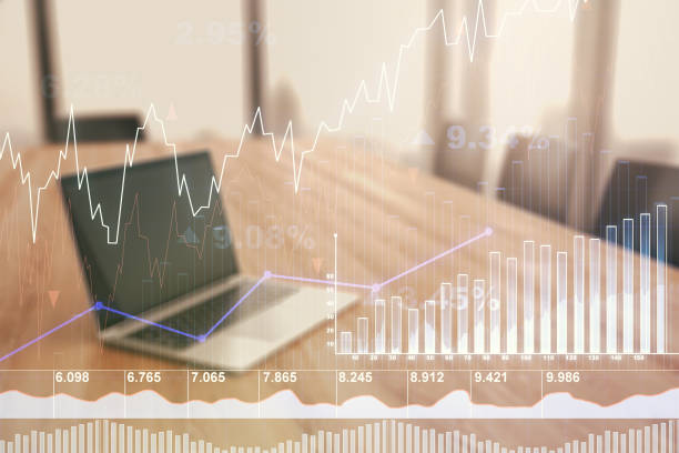 Abstract creative financial graph on modern laptop background, financial and trading concept. Multiexposure stock photo