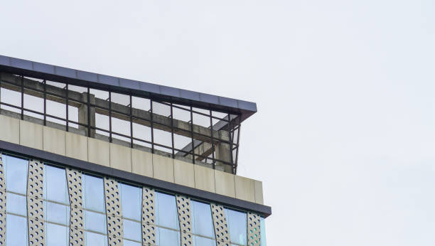 istock a high-rise building against the sunny sky. a building architecture modern concept. 1382378234