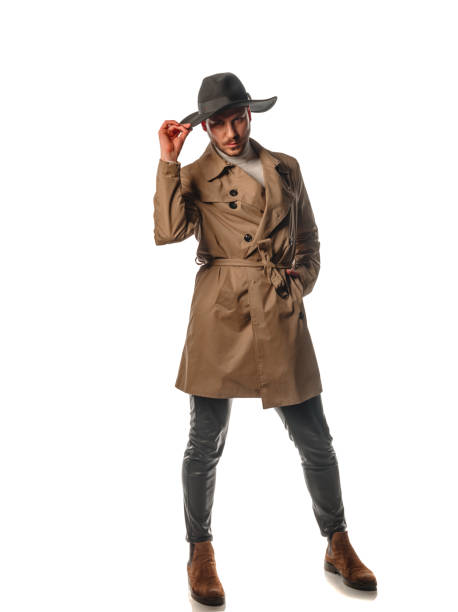 istock Attractive trendy man wearing black hat 1382378670