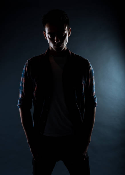 istock Silhouette fashionable man in studio 1382378888