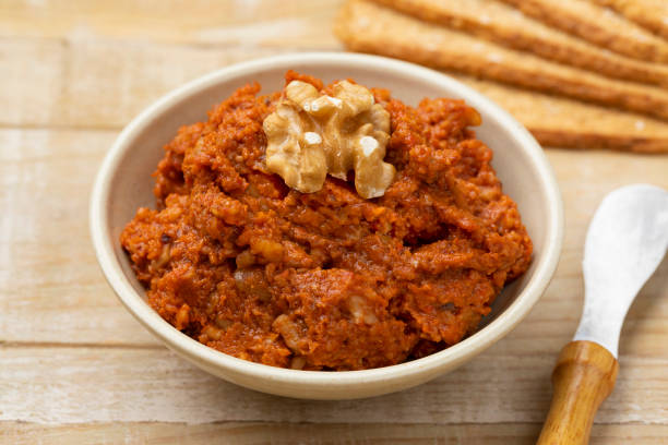 istock Bowl with fresh made muhammara close up 1382382390