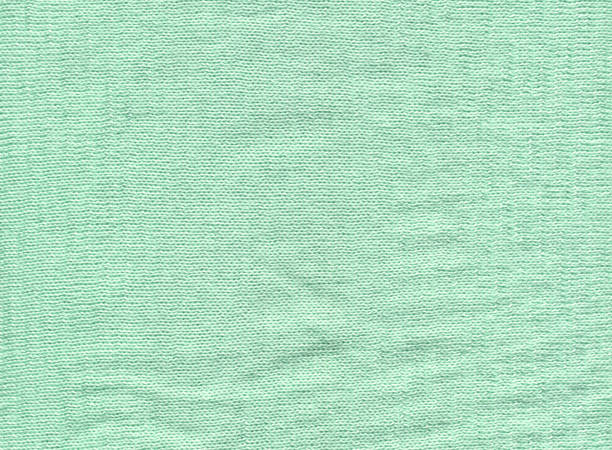 istock Turquoise knitted boho fabric texture with blank space for ads 1382382712